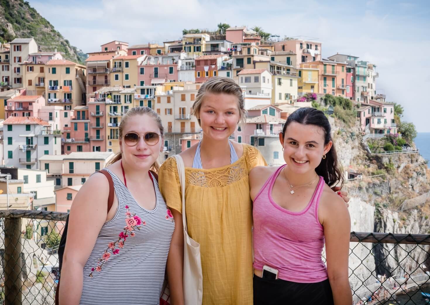 Three students smiling on greece and italy program