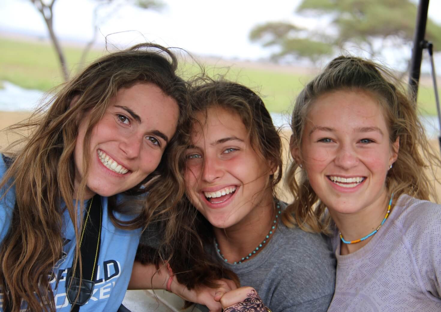 Three students smiling on greece and italy program