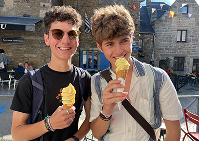 Three students smiling on greece and italy program