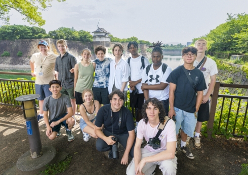 student group in front of osaka castle in japan